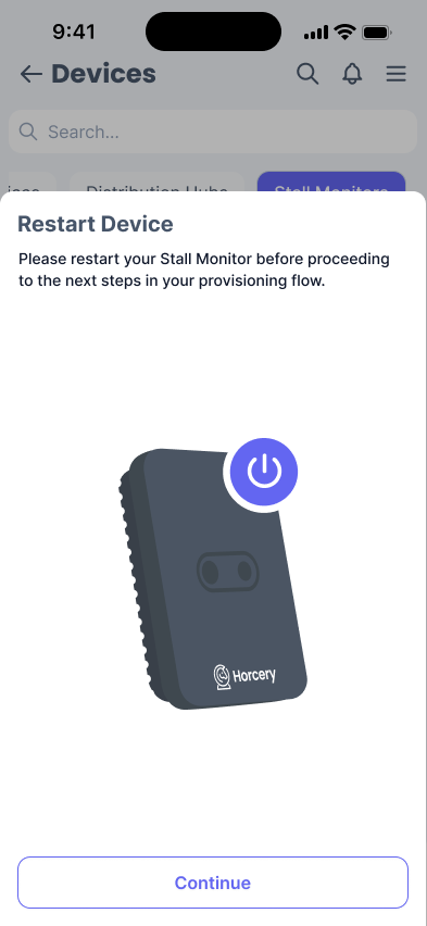 Phone screen with an illustration of a Stall Monitor and a power on icon, titled 'Restart Device'.