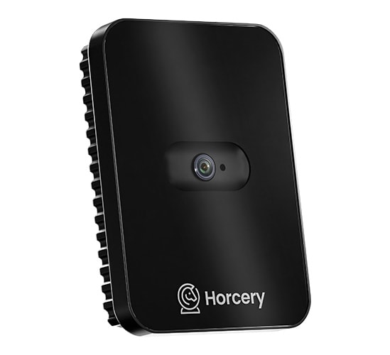 A close-up product image of the Horcery Stall Monitor device in sleek matte black, featuring dual sensors and the Horcery logo at the bottom. The unit has a compact, modern design.
